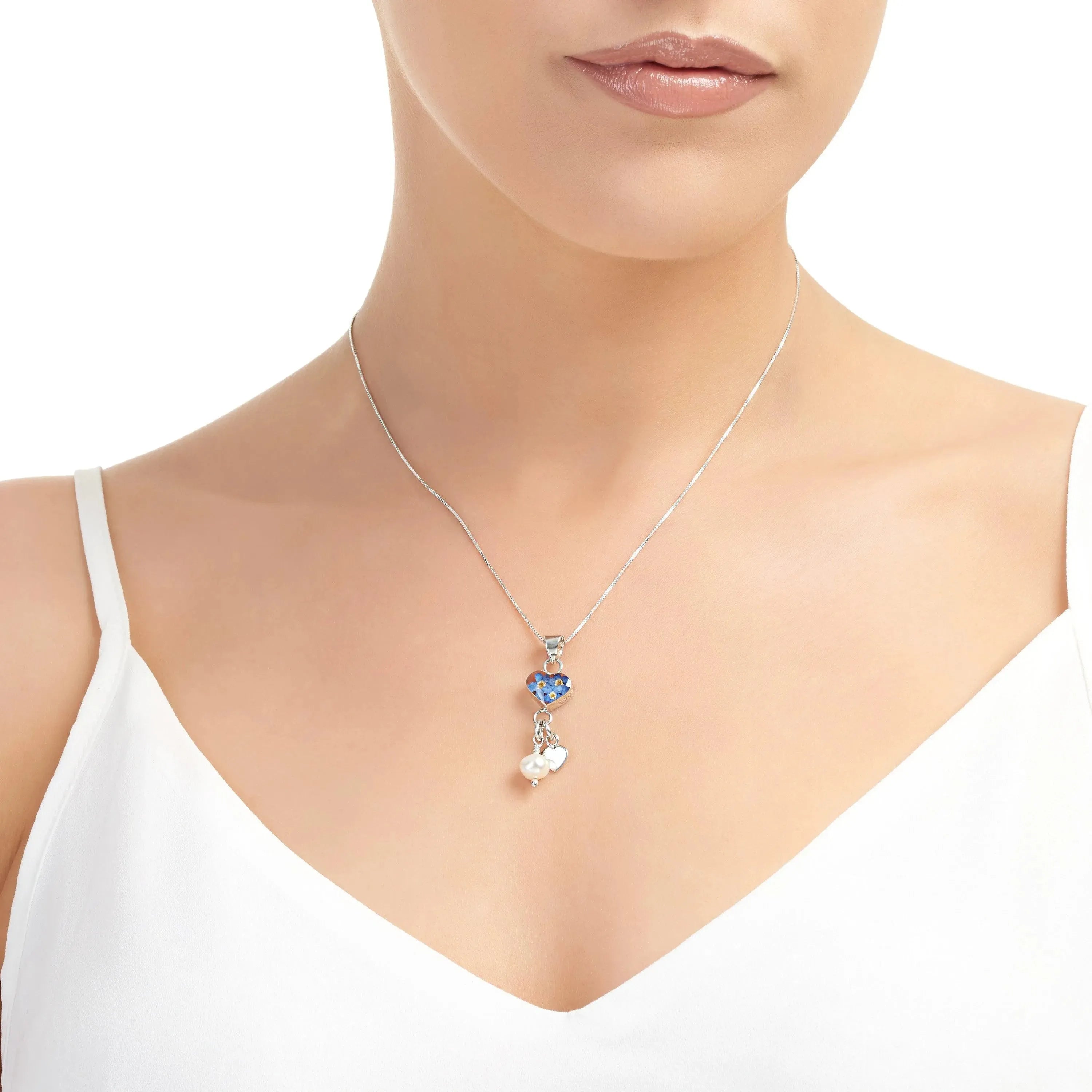 Forget-me-not necklace by Shrieking Violet® Sterling silver heart charm pendant with real forget-me-nots & a cultured pearl. Ideal for Mothers day.