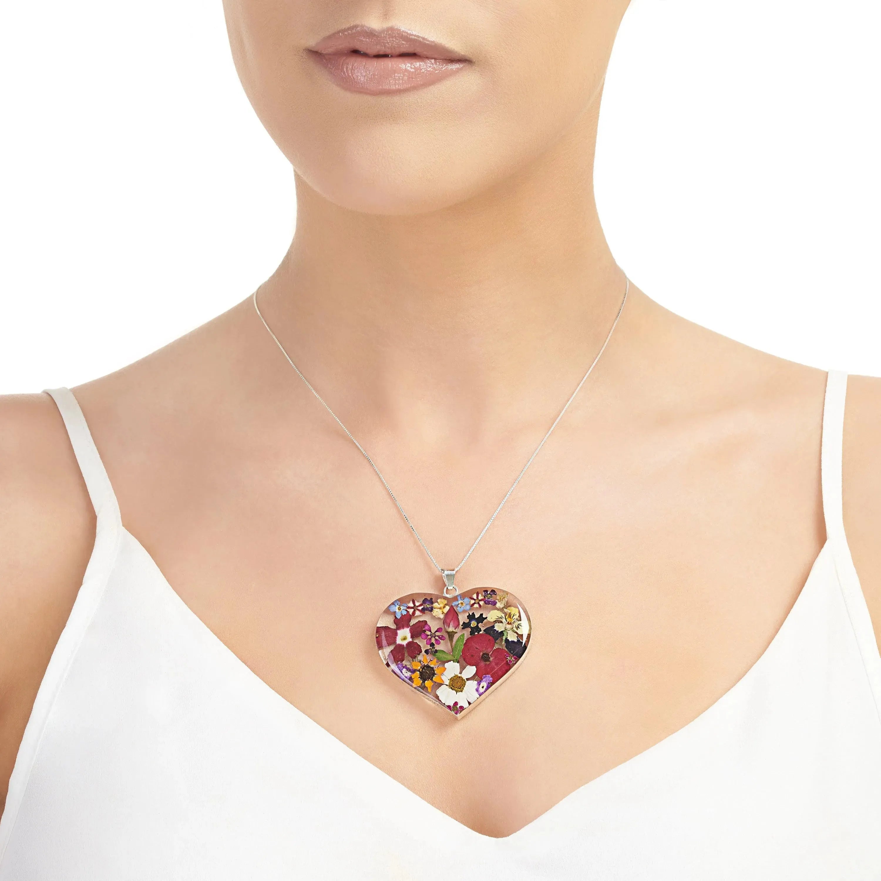 Shrieking Violet heart necklace with real flowers including rose, daisy, poppy, forget-me-not & sunflower. Statement jewellery for nature lovers