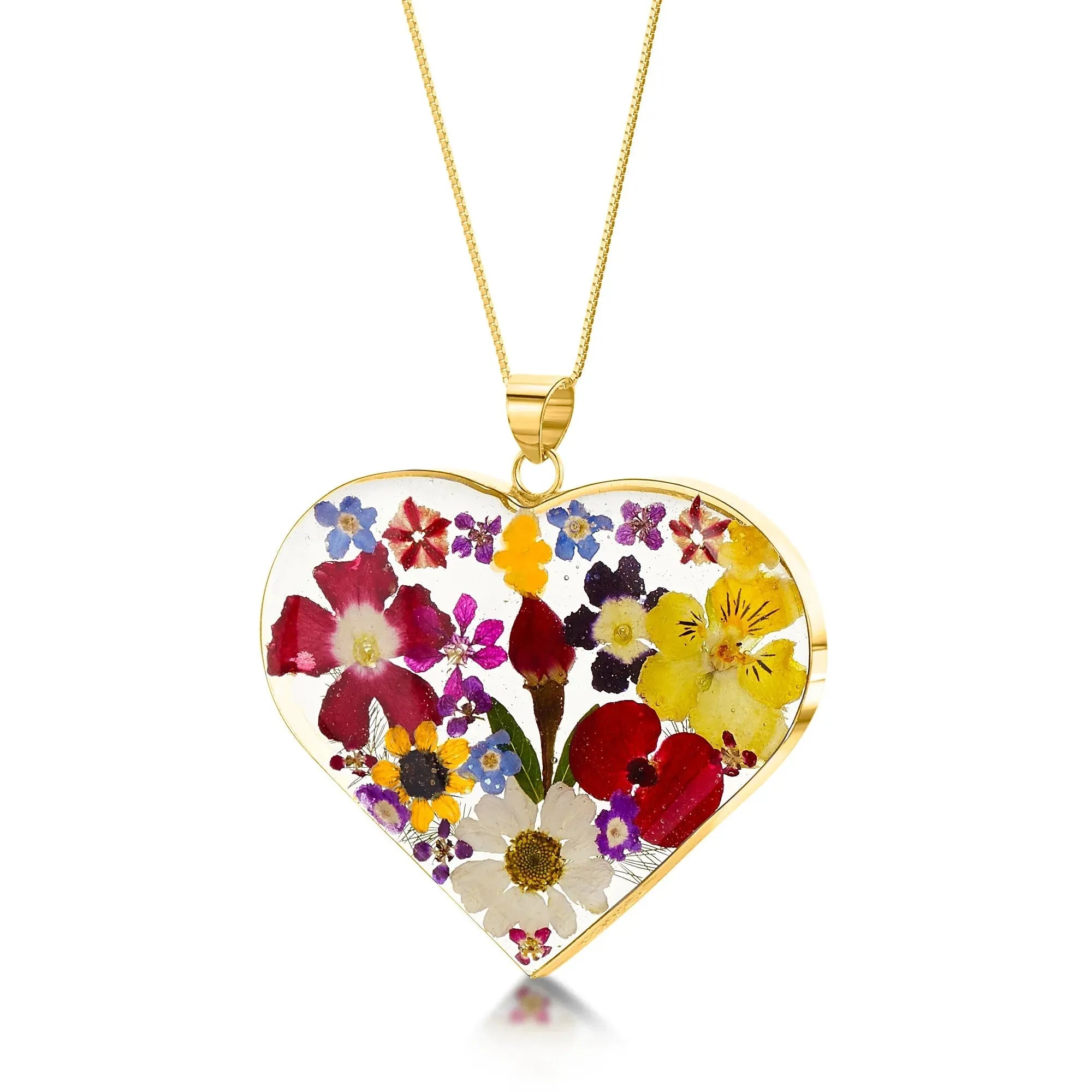 Zilveren hartketting met echte bloemen, met de hand gemaakt door Shrieking Violet