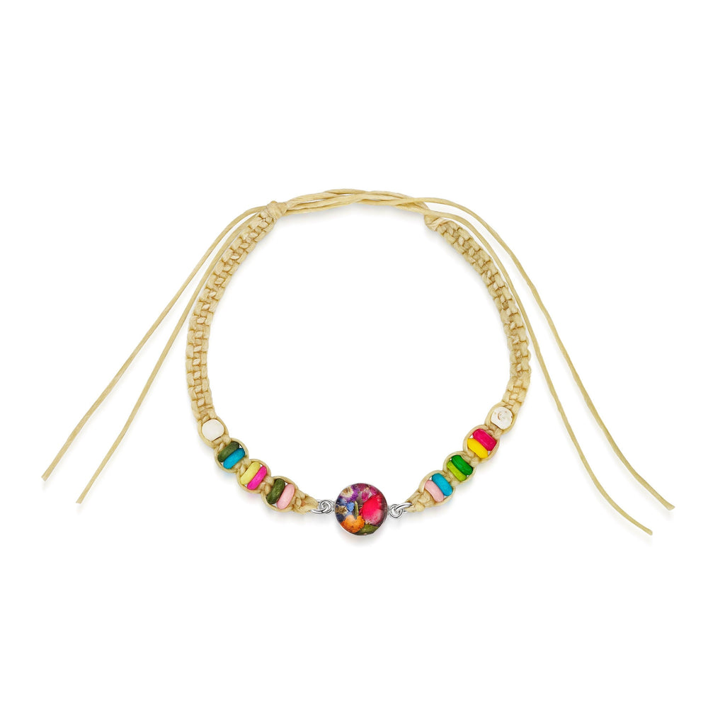 Friendship bracelet with colourful beads & a real flower charm.