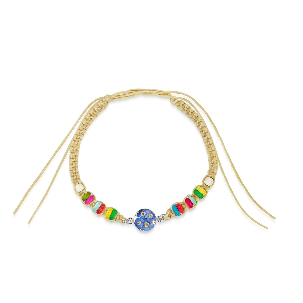 Friendship bracelet with colourful beads & a real flower charm.
