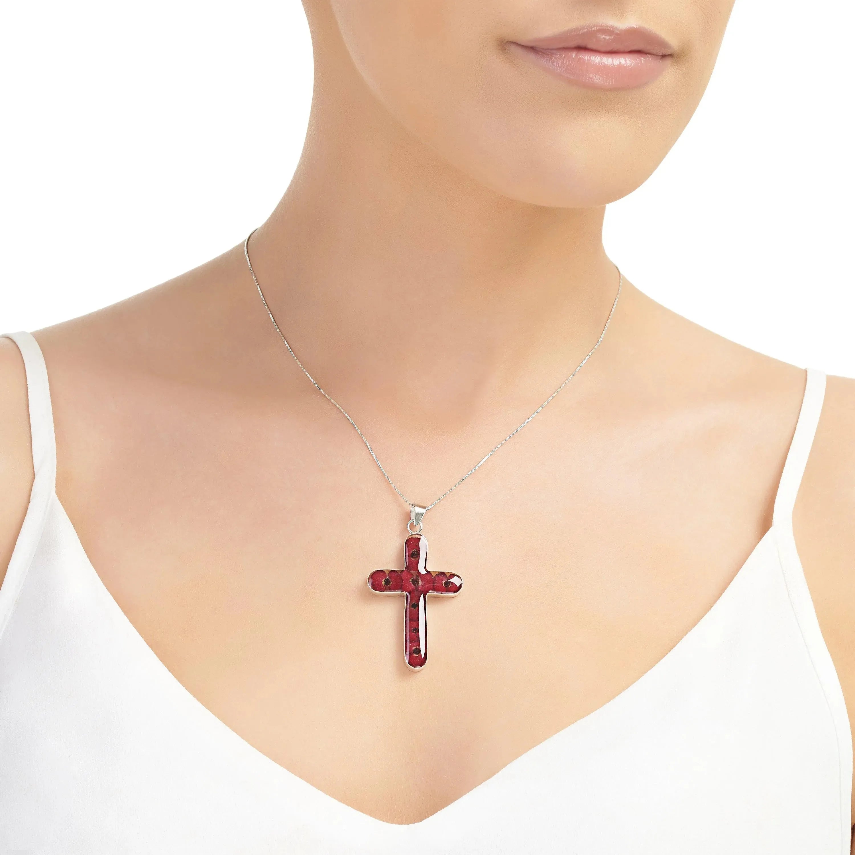 Poppy cross necklace by Shrieking Violet® Sterling silver pendant handmade with real Euphorbia milii flowers. Perfect jewellery gift for Christmas.