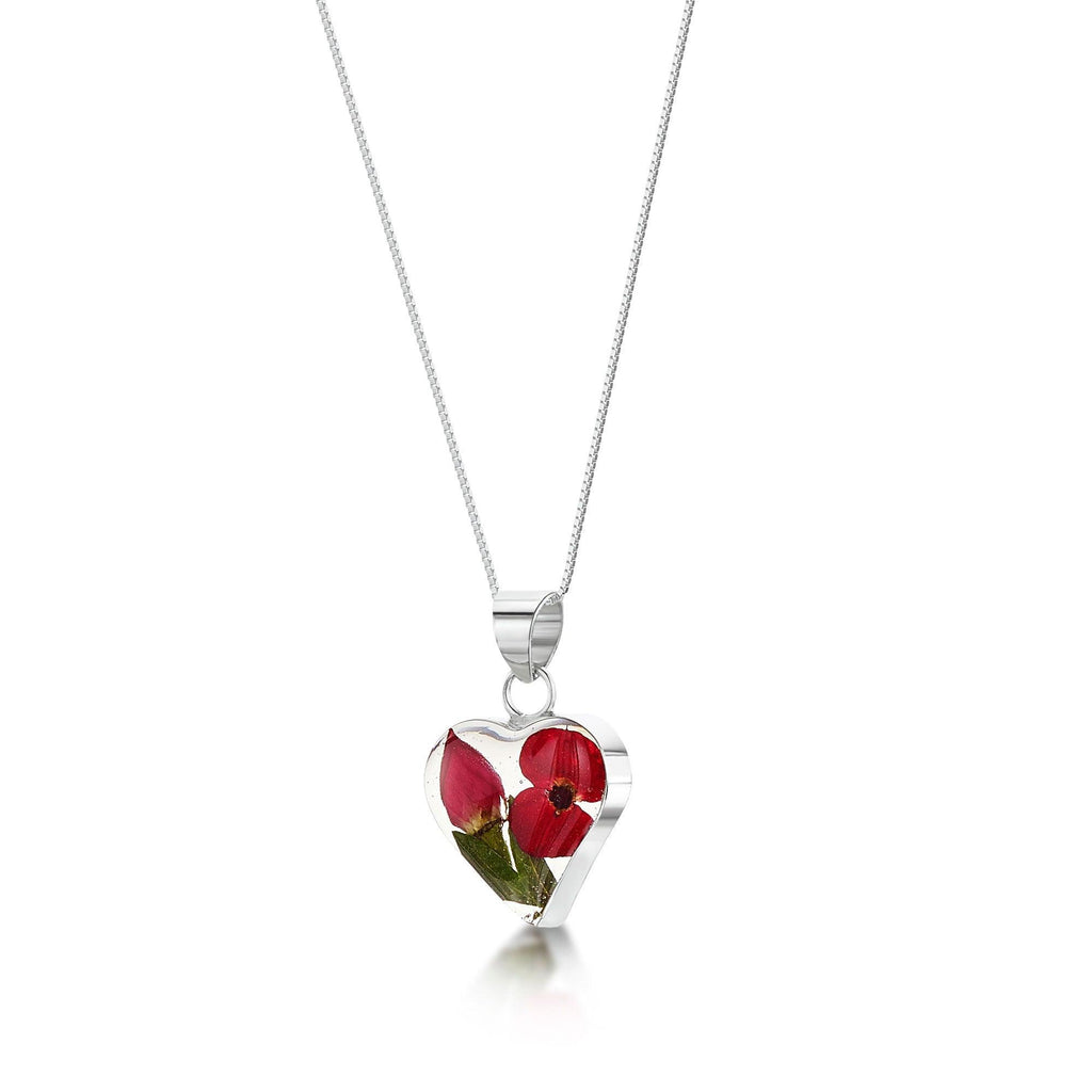 Poppy necklace by Shrieking Violet® Sterling silver swirl pendant with a mini poppy (Euphorbia milii). Handmade with real flowers