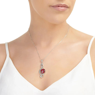 Treble clef musical note necklace with real flowers by Shrieking Violet Sterling silver pendant with a mini poppy flower. Ideal gift for musician.
